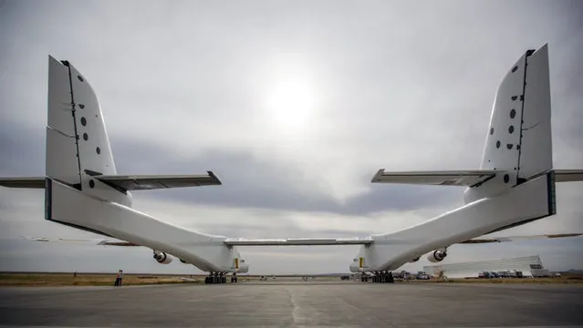 In this May 31, 2017 photo provided by Stratolaunch Systems Corp., the newly built Stratolaunch aircraft is moved out of its hangar for the first time in Mojave, Calif. The aircraft will undergo ground tests in preparation for flights in which the aircraft will launch rockets from high altitude. (Photo by Stratolaunch Systems Corp. via AP Photo)