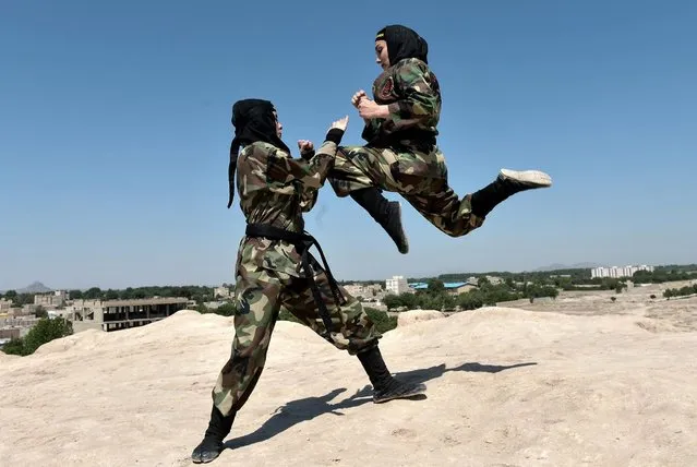 Iranian women perform as they train Far East Fighting Arts to be able to defend themselves, at the Jughin castle which is located 40 km's far from Tehran, Iran on June 5, 2017. (Photo by Fatemeh Bahrami/Anadolu Agency/Getty Images)