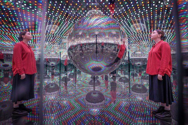 A woman visits Infinity Mirror Room, the latest of a series of installations by Yayoi Kusama in London on September 23, 2024. Every Day I Pray for Love is the Japanese artist’s 14th solo exhibition at the Victoria Miro gallery. (Photo by Guy Corbishley/Alamy Live News)