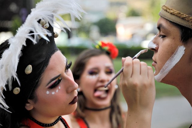 Folk dancers from Chile participate in a folk dance festival in Bitola, North Macedonia on July 26, 2023. (Photo by Ognen Teofilovski/Reuters)