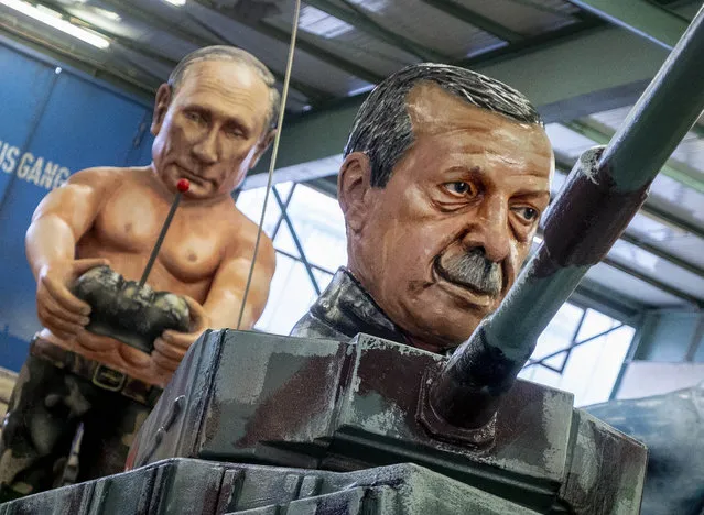 Two figures depicting Russia's President Vladimir Putin, left, and Turkish President Recep Tayyip Erdogan are shown during a press preview for the Mainz carnival, in Mainz, Germany, Tuesday, February 18, 2020. (Photo by Michael Probst/AP Photo)