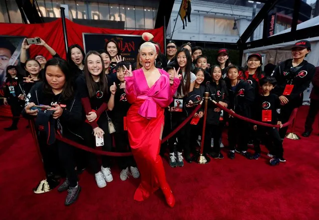 Soundtrack artist Christina Aguilera poses with fans at the premiere for the film “Mulan” in Los Angeles, California, U.S., March 9, 2020. (Photo by Mario Anzuoni/Reuters)