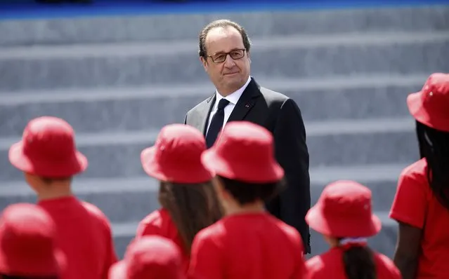 French President Francois Hollande attends the Bastille Day military parade on the Champs-Elysees in Paris, France, July 14, 2016. (Photo by Charles Platiau/Reuters)