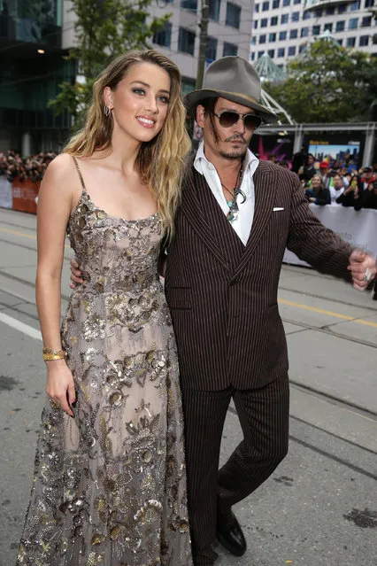 Amber Heard and Johnny Depp at the Focus Features “The Danish Girl” Premiere at 2015 Toronto International Film Festival on Saturday, September 12, 2015, in Toronto, Canada. (Photo by Eric Charbonneau/Invision for Focus Features/AP Images)