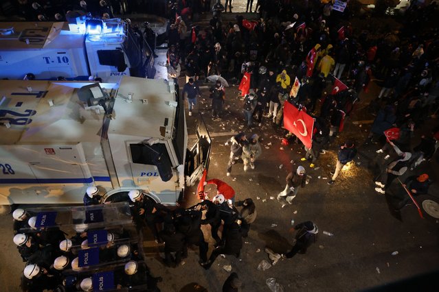 Turkish riot police police confront protesters during a protest against the arrest of Istanbul Mayor Ekrem Imamoglu in Ankara, Turkey, 22 March 2025. (Photo by Necati Savas/EPA/EFE)