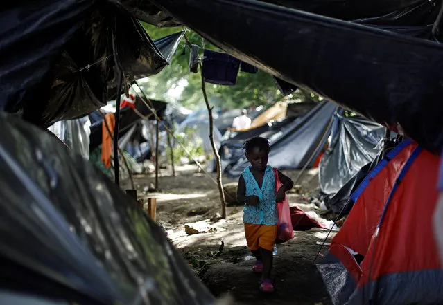 An African migrant child walks in a makeshift camp at the border between Costa Rica and Nicaragua, in Penas Blancas, Costa Rica, September 8, 2016. (Photo by Juan Carlos Ulate/Reuters)