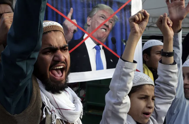 Pakistani religious students protest against U.S. President Donald Trump in Lahore, Pakistan, Friday, January 5, 2018. A senior Pakistani senator has expressed disappointment at the U.S. decision to suspend military aid to Islamabad, saying it will be detrimental to Pakistani-U.S. relations. Nuzhat Sadiq, the chairwoman of the Senate Foreign Affairs committee in the upper house of parliament, says Islamabad can manage without the United States as it did in the 1990s, but would prefer to move the troubled relationship forward.(Photo by K.M. Chaudary/AP Photo)