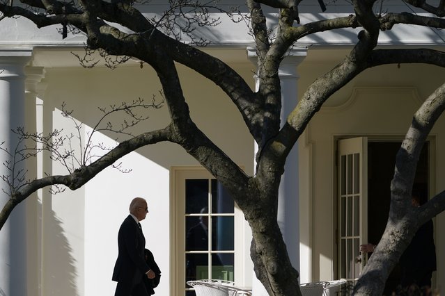 President Joe Biden walks to the Oval Office of the White House after stepping off Marine One, Monday, January 16, 2023, in Washington. Biden is returning to Washington after spending the weekend at his home in Delaware. (Photo by Patrick Semansky/AP Photo)