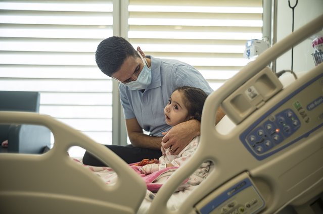 Yaqeen Kankar, a Syrian girl with spinal muscular atrophy begins treatment at Al Jalila hospital in Dubai on July 18, 2025 with her her father Ibrahim Kankar. (Photo by Antonie Robertson/The National)