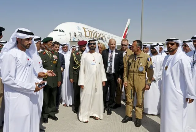 United Arab Emirates Vice President, Prime Minister and Dubai Ruler Sheikh Mohammed bin Rashid al-Maktoum (C) tours the Dubai Airshow November 8, 2015. (Photo by Ahmed Jadallah/Reuters)