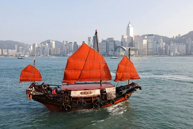 A traditional wooden tourist junk boat “Dukling”, sails in the waters of Victoria Harbour, during the COVID-19 pandemic, in Hong Kong, China on October 31, 2020. (Photo by Tyrone Siu/Reuters)