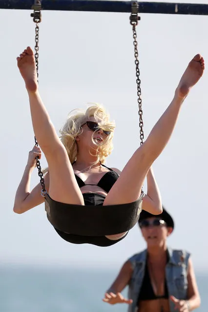 American reality show contestant Courtney Stodden is caught kissing a mystery woman on the beach in Santa Monica, CA on September 16, 2016. Courtney and the mystery brunette couldn't keep their hands of each other and didn't seem to care who saw their antics as they frolicked on the sand. (Photo by Canham/Splash News)