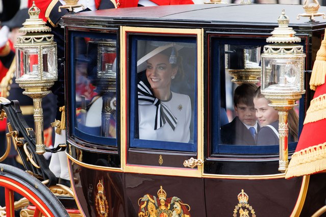 Britain's Catherine Princess of Wales (C) smiles as she travels with Prince Louis (2-R) and Princess Charlotte (R) from Buckingham Palace to Horse Guards Parade inside a carriage during the Trooping the Colour parade in London, Britain, 15 June 2024. The Princess of Wales made her first public appearance since she disclosed that she has been diagnosed with cancer in March 2024. The king's birthday parade, traditionally known as Trooping the Colour, is a ceremonial military parade to celebrate the official birthday of the British sovereign. (Photo by Tolga Akmen/EPA/EFE/Rex Features/Shutterstock)
