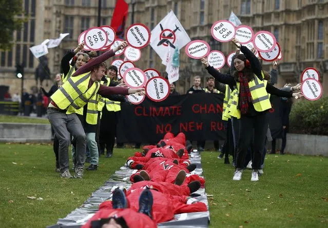 Demonstrators protest on Abbingdon Green before the government's announcement on airport expansion, in London, Britain October 25, 2016. (Photo by Peter Nicholls/Reuters)