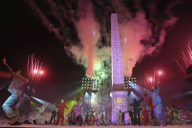 Fireworks are fired during the Opening Ceremony for the 2024 Paralympics, Wednesday, August 28, 2024, in Paris, France. (Photo by Thibault Camus/Pool via AP Photo)