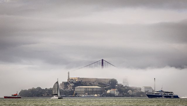 The clouds and fog shroud the Golden Gate Bridge and Alcatraz Island in San Francisco Bay as seen from Treasure Island in San Francisco, on Wednesday, September 18, 2024. (Photo by Carlos Avila Gonzalez/San Francisco Chronicle via AP Photo)