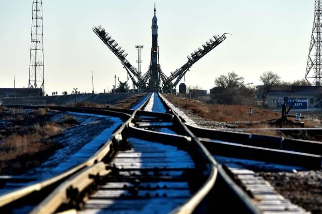 The Soyuz TMA-19M spacecraft is mounted on a launch pad at the Russian-leased Baikonur cosmodrome in Kazakhstan early on December 13, 2015. Russia's Soyuz TMA-19M spacecraft carrying the International Space Station (ISS) Expedition 46/47 crew of Britain's astronaut Tim Peake, Russian cosmonaut Yuri Malenchenko and US astronaut Tim Kopra is scheduled to blast off to the ISS on December 15, 2015. (Photo by Kirill Kudryavtsev/AFP Photo)