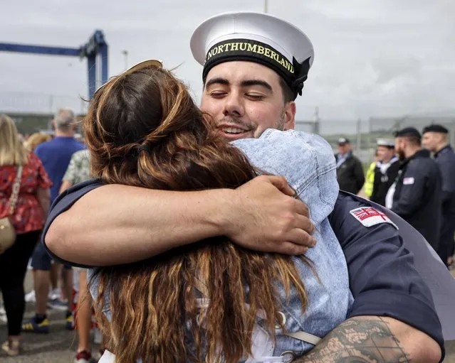 The crew of HMS Northumberland are welcomed home at the Devonport naval base in the second decade of August 2023. The Royal Navy Type 23 frigate has been operating across the Arctic, Baltic and the North Atlantic, locating Russian units and protecting UK waters. (Photo by Royal Navy/The Times)