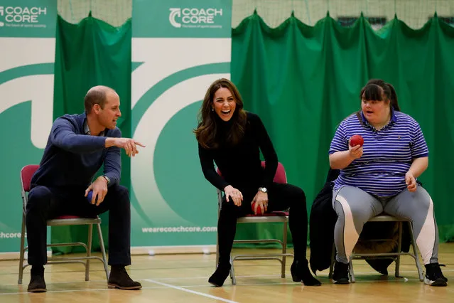 Britain's Prince William and Catherine, Duchess of Cambridge, play boccia with a participant during a visit to Coach Core Essex, in Basildon, Britain October 30, 2018. (Photo by Adrian Dennis/Pool via Reuyers)