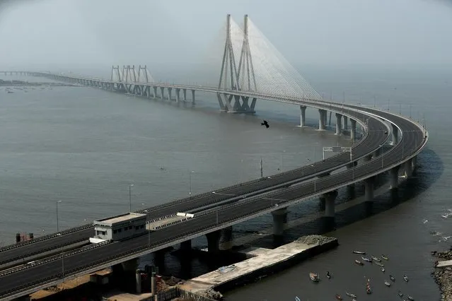 A deserted Bandra-Worli sea link is seen during a weekend lockdown to limit the spread of the coronavirus disease (COVID-19) in the country, in Mumbai, India, April 10, 2021. (Photo by Francis Mascarenhas/Reuters)