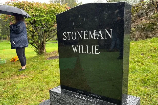 The gravestone of James Murphy, a man who was accidentally mummified and known publicly by the name “Stoneman Willie”, is seen after he was publicly identified and buried after being on display at a local funeral home that has been his resting place for 128 years, in Reading, Pennsylvania, U.S., October 7, 2023. (Photo by Julio-Cesar Chavez/Reuters)
