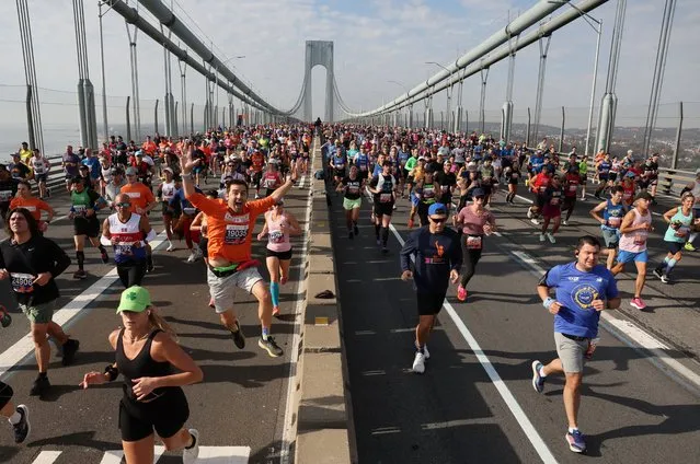 General view of runners crossing the Verrazzano-Narrows Bridge during the New York City Marathon in New York on November 5, 2023. (Photo by Brendan Mcdermid/Reuters)