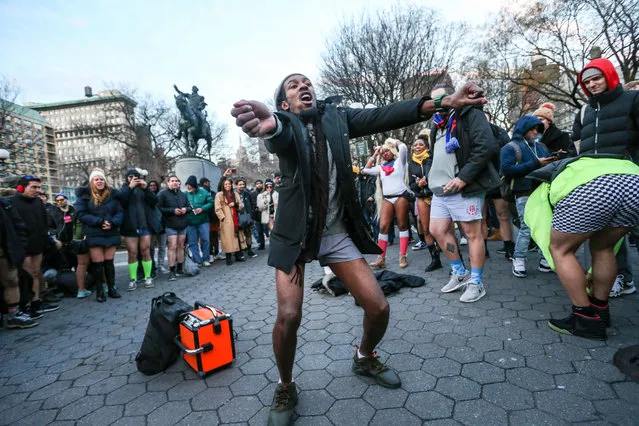 Young people wearing no pants participate in the “No Pants Subway Ride” in  New York City, 13 January 2019. No Pants Subway Ride is an annual global event started in New York, USA in 2002. (Photo by William Volcov/ZUMA Wire)
