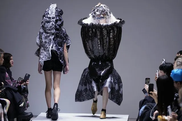 A model wears a creation for the Comme Des Garcons ready-to-wear Spring/Summer 2023 fashion collection presented in Paris, France, Saturday, October 1, 2022. (Photo by Francois Mori/AP Photo)
