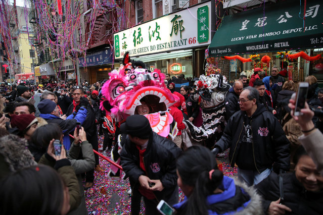 People celebrate the Lunar New Year in Chinatown in Manhattan, New York City, U.S., January 28, 2017. (Photo by Stephen Yang/Reuters)