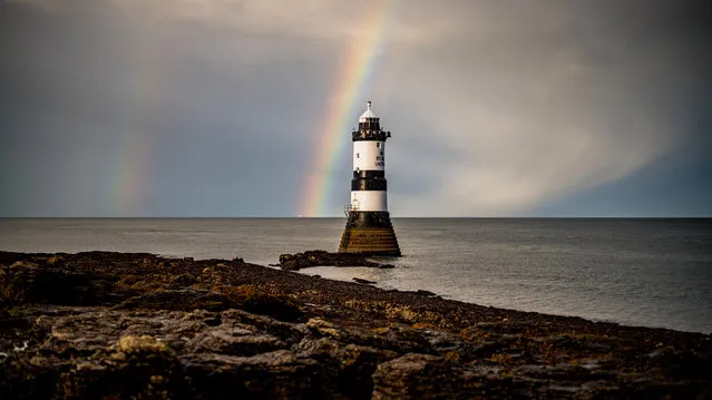 The Trwyn Du Lighthouse on Anglesey in Wales, UK marks the passage between Black Point and Puffin Island, warding off ships from rocks hidden at high tide. Picture date: Sunday, November 12, 2023. (Photo by Charlotte Graham/The Times)