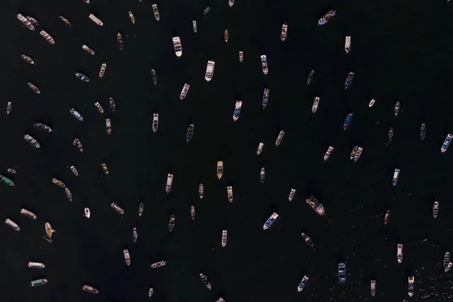 Boats float on the bay in Tongoy, Chile, Monday, January 22, 2024. (Photo by Matias Basualdo/AP Photo)