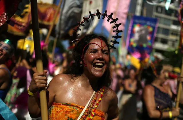 A reveller takes part in the annual block party Cordao de Boitata during pre-carnival festivities in Rio Janeiro, Brazil February 19, 2017. (Photo by Pilar Olivares/Reuters)
