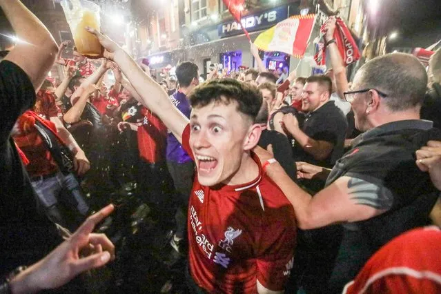 Liverpool supporters celebrate after winning the UEFA Champions League final in the Liverpool exhibition centre in Liverpool, Britain, 01 June 2019. Liverpool won 2-0. (Photo by Mercury Press)
