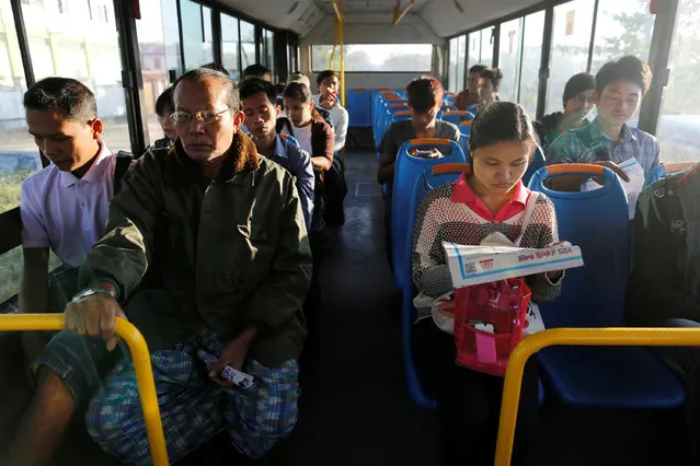 People ride a bus as they travel in Yangon, Myanmar January 16, 2017. (Photo by Soe Zeya Tun/Reuters)
