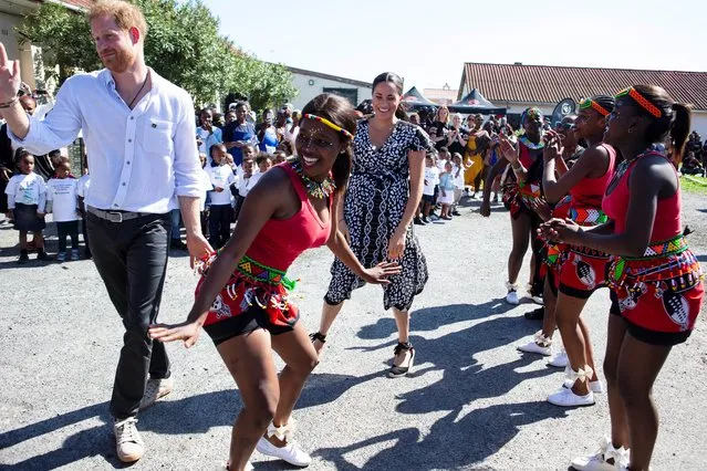 Harry and Meghan are seen during a Justice Desk initiative in Nyanga township in Cape Town, South Africa, September 23, 2019. (Photo by Ian Vogler/Pool via Reuters)