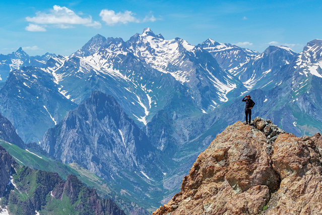 A view of the Cilo Mountains from Yuksekova while a group of adrenaline seekers, including climbers and skiers, climb and ski in 3,500-altitude region in the area where the Ikiyaka Mountains and Sat Glacier Lakes are located in Hakkari of Turkiye on June 19, 2024. (Photo by Ozkan Bilgin/Anadolu via Getty Images)