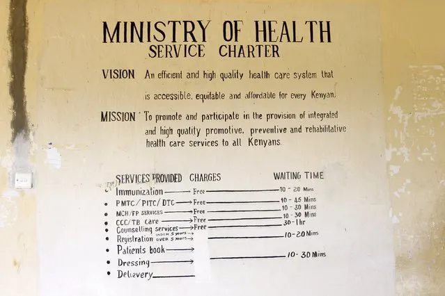 A Ministry of Health notice and price list is displayed on the wall of the Kogelo Dispensary in the village of Kogelo, west of Kenya's capital Nairobi, July 16, 2015. (Photo by Thomas Mukoya/Reuters)