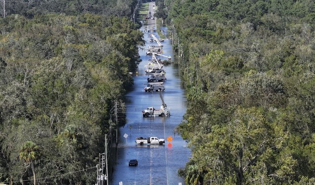 In this aerial view, power crews work on the lines after Hurricane Helene passed offshore on September 27, 2024 in Crystal River, Florida. Hurricane Helene made landfall Thursday night in Florida's Big Bend with winds up to 140 mph and storm surges. (Photo by Joe Raedle/Getty Images)