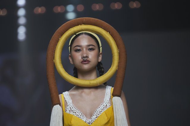 A model presents a creation as part of the Issue show, during Paragon Bangkok International Fashion Week in Thailand, Friday, October 4, 2024. (Phoot by Sakchai Lalit/AP Photo)