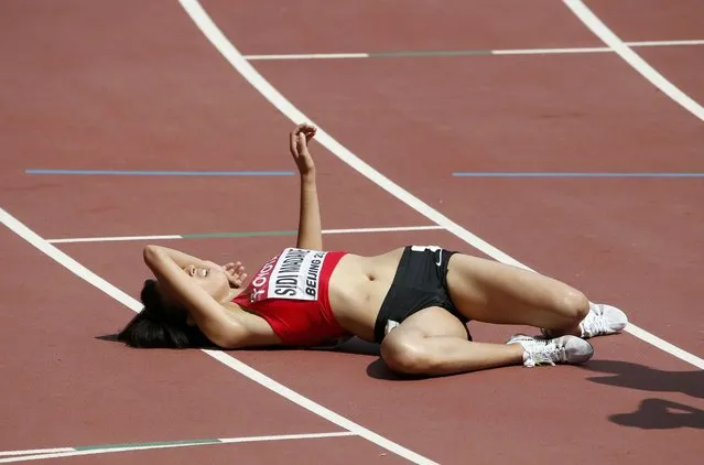 Fadwa Sidi Madane of Morocco lies exhausted the women's 3,000 metres steeplechase heat during the 15th IAAF World Championships at the National Stadium in Beijing, China August 24, 2015. (Photo by David Gray/Reuters)