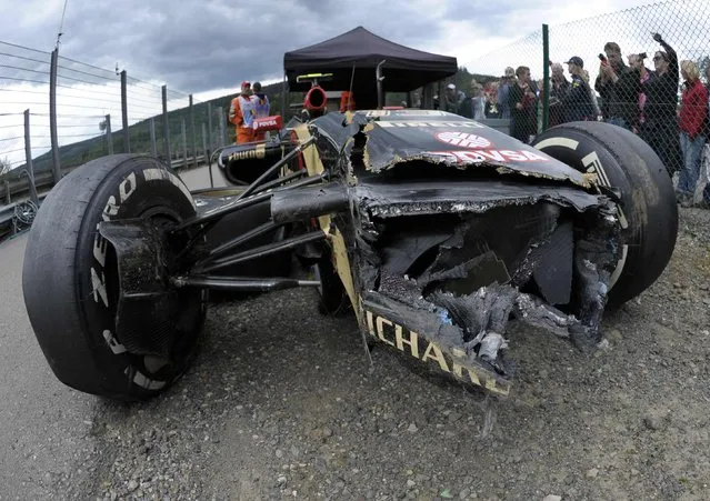 The car of Lotus Formula One driver Pastor Maldonado of Colombia is pictured after a crash during a practice session at the Belgian F1 Grand Prix in Spa-Francorchamps August 22, 2014. (Photo by Laurent Dubrule/Reuters)