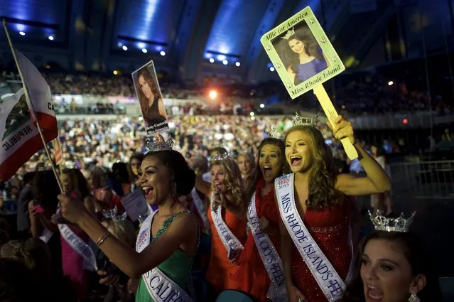 Beauty pageant winners cheer at the one minute countdown to broadcast of the 95th Miss America Pageant at Boardwalk Hall, in Atlantic City, New Jersey, September 13, 2015. (Photo by Mark Makela/Reuters)