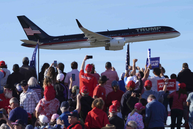 The plane carrying Republican presidential nominee former President Donald Trump prepares to land at a campaign rally at Kinston Jet Center, Sunday, November 3, 2024, in Kinston, N.C. (Photo by Evan Vucci/AP Photo)
