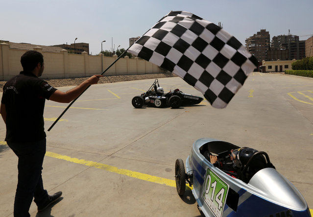 Egyptian university students test the cars which their teams built to compete at the Global Hybrid-Electric Challenge for the first car and for Formula Student UK for the second car in Cairo, Egypt September 2, 2016. (Photo by Mohamed Abd El Ghany/Reuters)