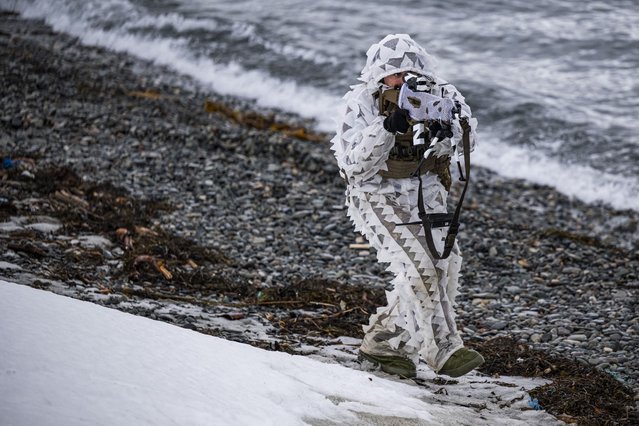 Marines in action during an amphibious assault demonstration, part of the Nordic Response 24 military exercise on March 10, 2024, at sea near Sorstraumen, above the Arctic Circle in Norway. Nordic Response 24 is part of the larger NATO exercise Steadfast Defender. The exercise involves air, sea, and land forces, with over 100 fighter jets, 50 ships, and over 20,000 troops practicing defensive manoeuvres in cold and harsh weather conditions. (Photo by Jonathan Nackstrand/AFP Photo)