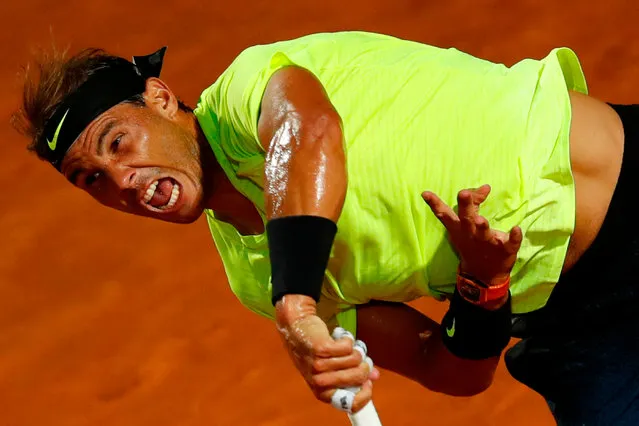 Spain's Rafael Nadal serves to Spain's Pablo Carreno Busta on day three of the Men's Italian Open at Foro Italico on September 16, 2020 in Rome, Italy. (Photo by Clive Brunskill/Pool via AFP Photo)
