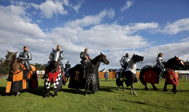 Jousting knights on horseback gather before the final round of the jousting competition the St Ives Medieval Fair in Sydney, one of the largest of its kind in Australia, September 25, 2016. (Photo by Jason Reed/Reuters)