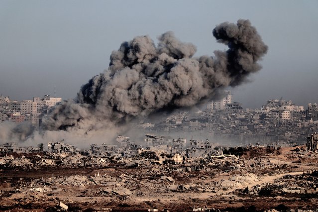 This picture taken from a position at Israel's border with the Gaza Strip shows smoke billowing during an Israeli strike on the besieged Palestinian territory on July 17, 2025. (Photo by Jack Guez/AFP Photo)
