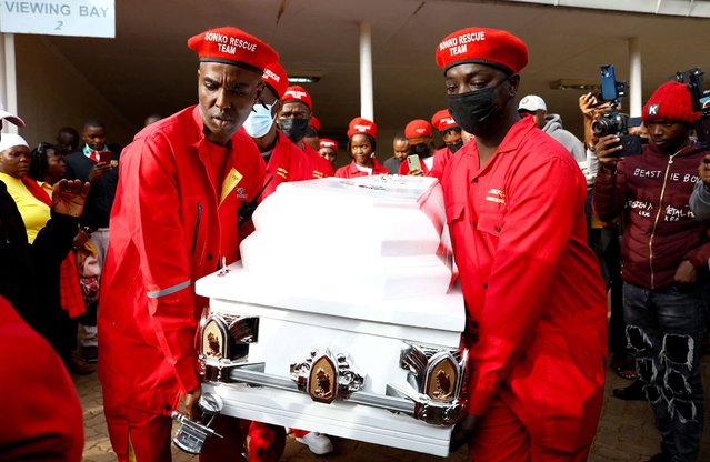 Pallbearers carry the coffin of slain hawker Boniface Kariuki, who was shot in the head by police during protests last month, ahead of his burial at the Kenyatta University Funeral Home in Nairobi, Kenya on July 11, 2025. (Photo by Thomas Mukoya/Reuters)