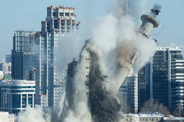 The unfinished and abandoned TV tower collapses during a controlled demolition in Yekaterinburg, Russia on March 24, 2018. (Photo by Alexei Kolchin/Reuters)